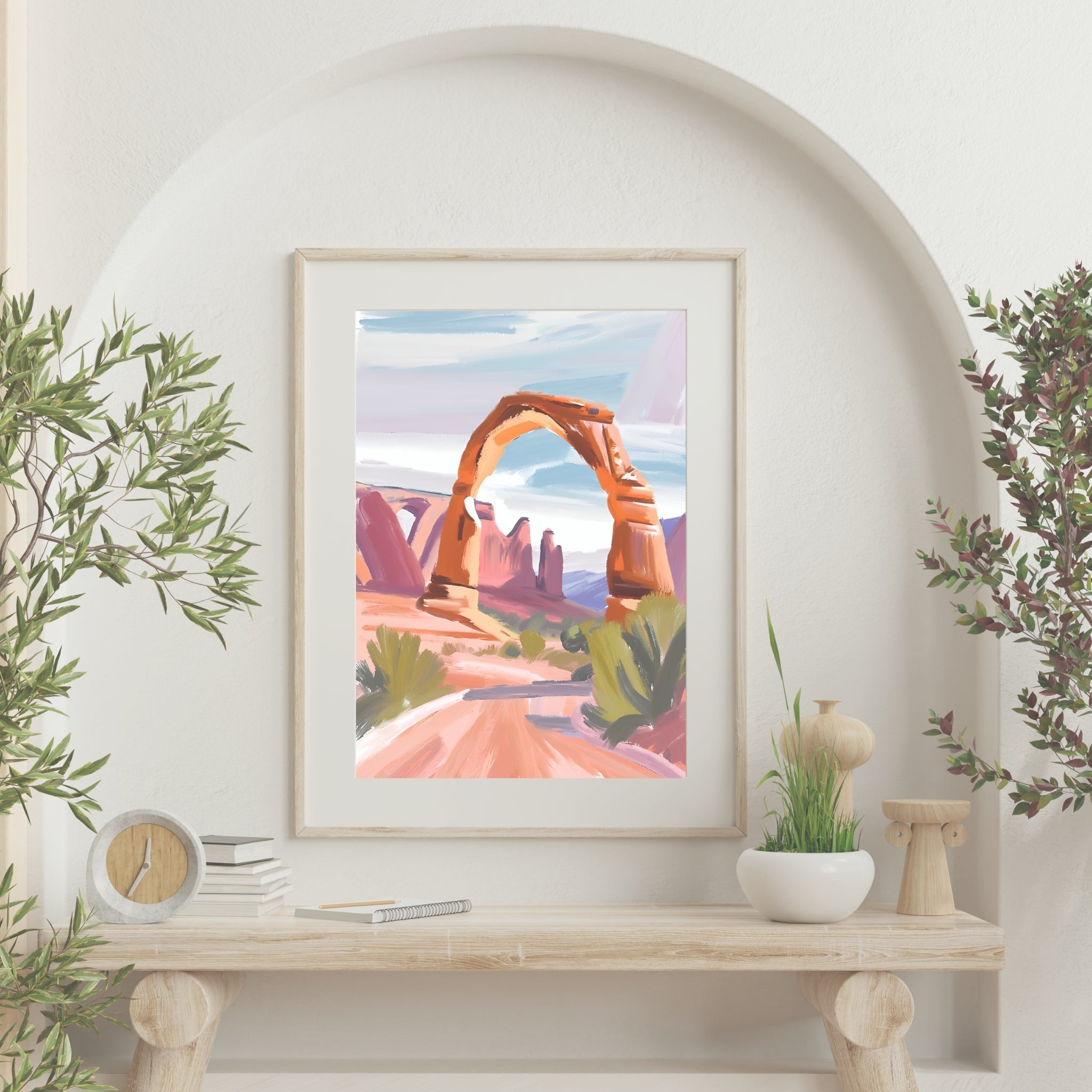 Yosemite, Arches and Yellowstone Wall Art prints hung above couch on wall.