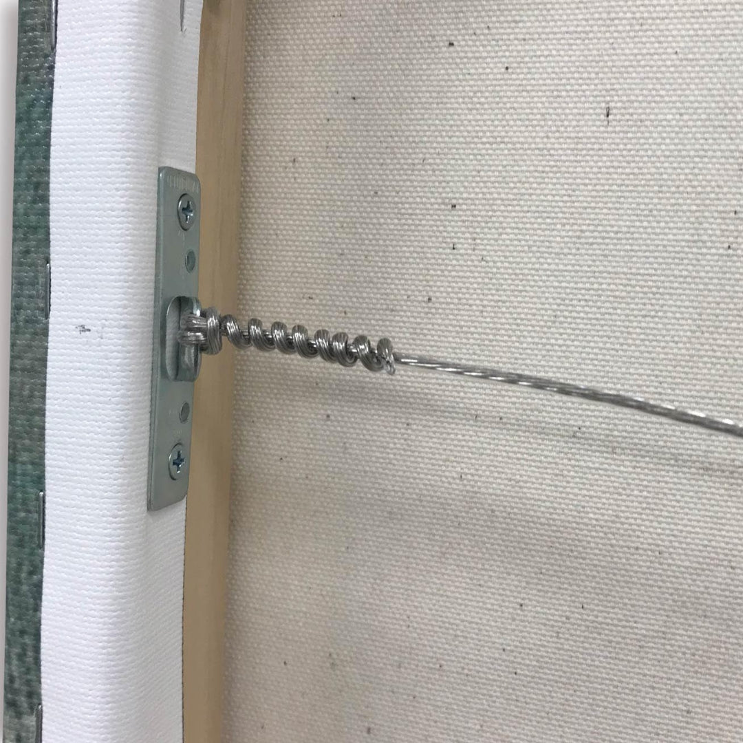 a close up of a ready to hang wire of the back of a gallery wrapped canvas