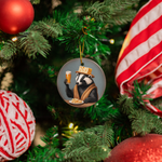 a christmas ornament hanging from a christmas tree