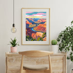 a painting hanging on a wall next to a chair