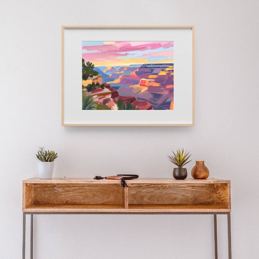 a painting hanging on a wall above a wooden table