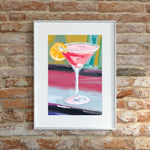 a painting of a cosmo martini with a slice of lemon