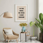 a living room with a chair and a table