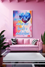 Fine Art Giclee Print - Love is the paint that makes our hearts a masterpiece - in a white picture frame on a pink wall in a bold living room.