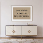 a picture hanging on a wall above a dresser