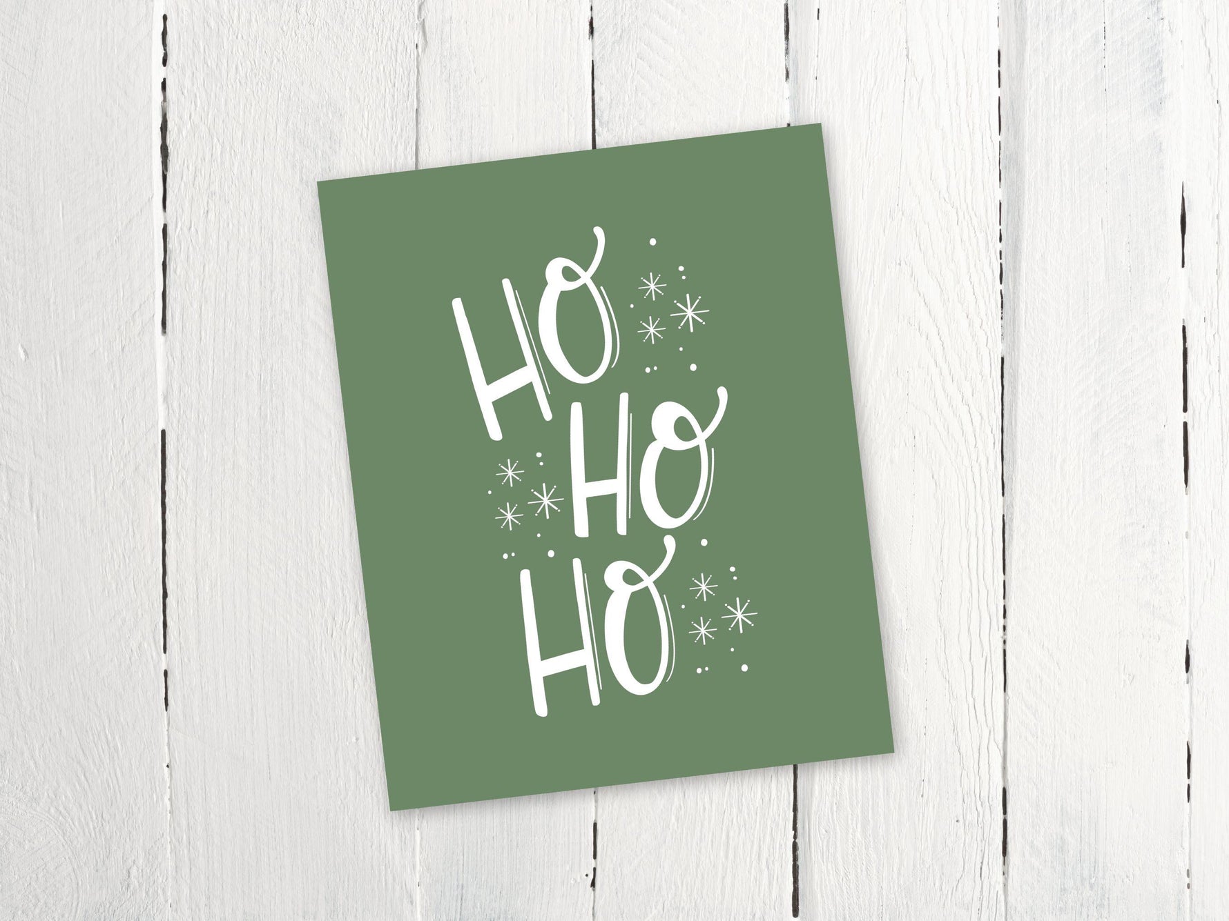 a greeting card with the words ho ho on it